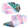 2-in-1 folding kids couch in multicolor with glow-in-the-dark design, converts to lounger for cozy playtime and napping.