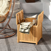Square acacia wood side table with storage, featuring slatted design and openable top for easy access, ideal for.