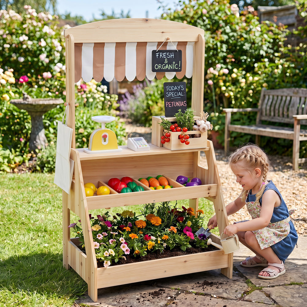 Wooden 2-in-1 market stand and mud kitchen for kids, featuring a planter box, chalkboards, and realistic accessories.