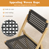 Folding chair with woven rope seat and teak wood frame, ideal for outdoor dining and easy storage.