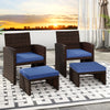 Navy blue PE rattan ottoman footstool with removable cushion, perfect for outdoor gatherings or as a coffee table.
