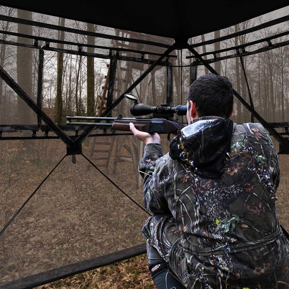 Hunting blind with 270-degree see-through fabric, accommodating 2-3 persons, ideal for silent observation and aiming.
