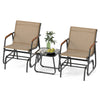 Two glider chairs with teak wood armrests and a side table, perfect for outdoor relaxation in a patio or garden setting.