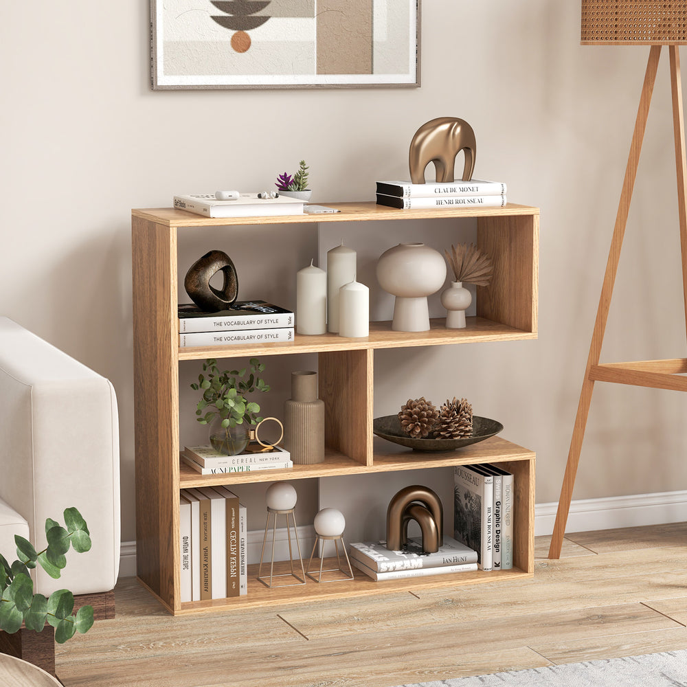 Concave 3-shelf open bookcase in light wood, featuring geometric design and anti-toppling device for versatile storage.
