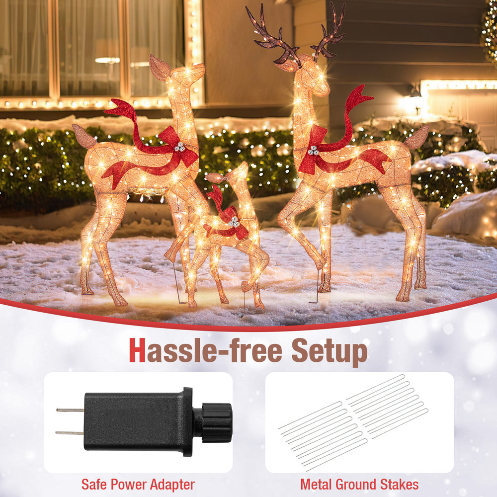 Warm white LED lights illuminate the festive bows on this 5 ft doe from the 3-piece pre-lit Christmas deer family set.
