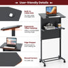 Height adjustable lectern table in black with ergonomic tilted tabletop and built-in cable hole for organized use.