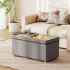 Gray storage ottoman bench with tray and rubber wood legs, perfect for living rooms and versatile use as a coffee table.