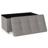 Gray storage ottoman bench with flip-over lid, rubber wood legs, and 20.5-gallon capacity for versatile home use.
