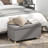 Gray storage ottoman bench with rubber wood legs, featuring a flip-over lid and 20.5-gallon capacity for versatile use.