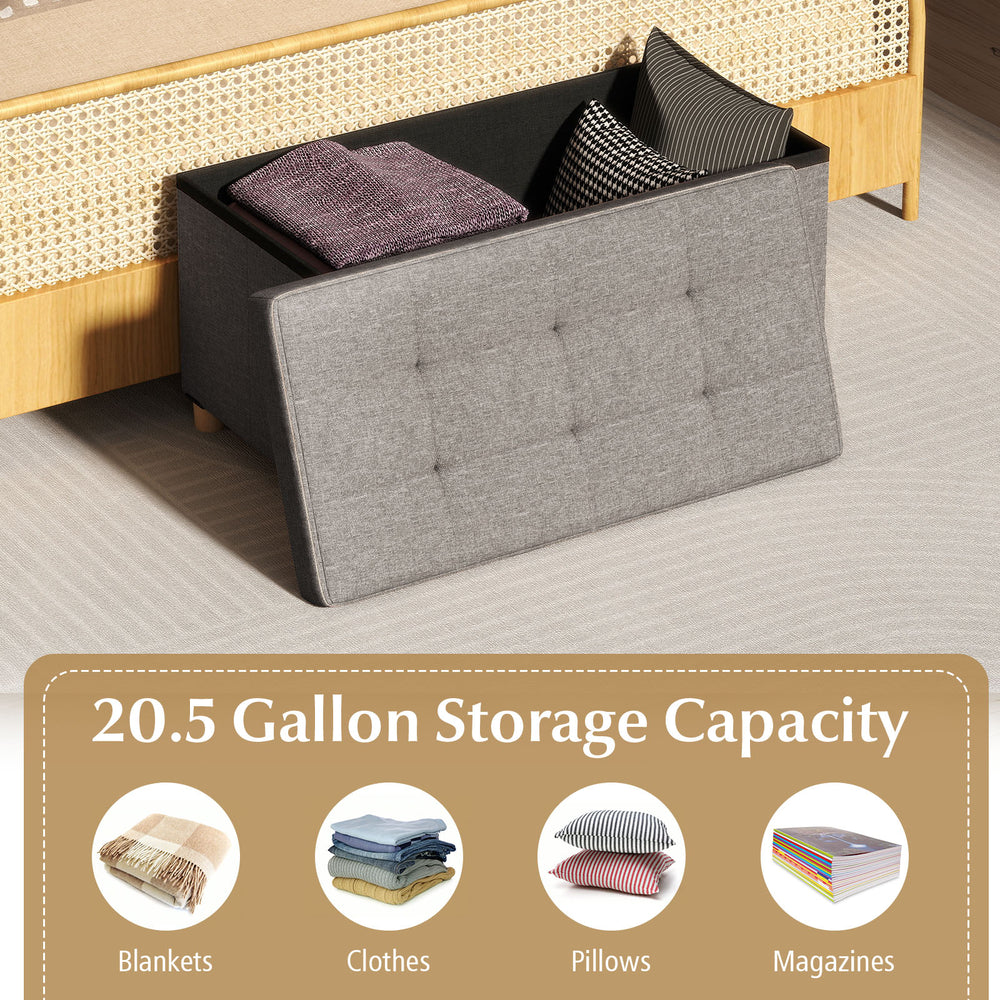 Gray storage ottoman bench with 20.5-gallon capacity, rubber wood legs, and flip-over lid for versatile use.