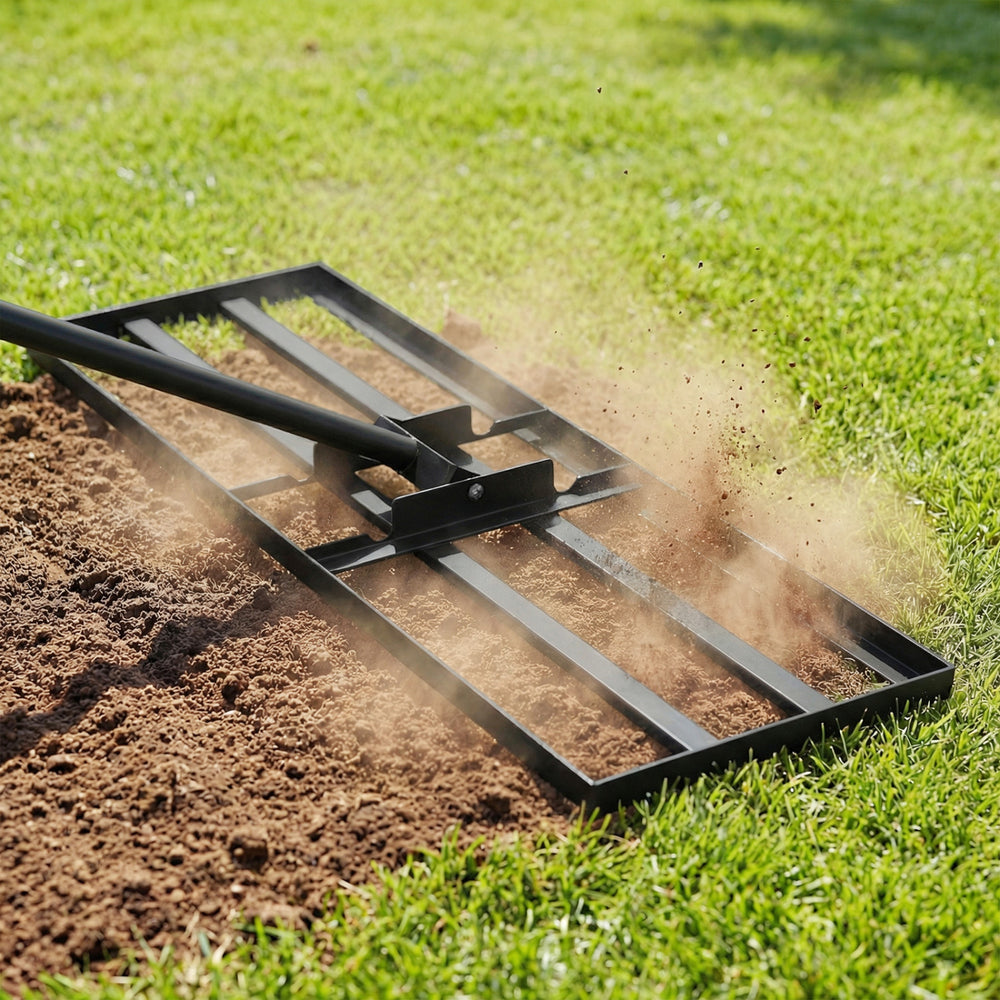 Close-up of the heavy duty lawn level tool's wide rake plate, designed for efficient soil leveling in gardens and farms.