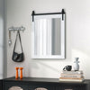 Wall mount mirror with white wood frame and black metal bracket, ideal for rustic decor in bedrooms or living rooms.