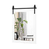 Wall-mounted mirror with a solid wood frame and black metal bracket, ideal for rustic decor in bedrooms or living rooms.