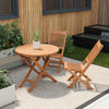 Folding 31.5-inch round coffee table made of high-grade teak wood, ideal for outdoor dining in backyard or balcony.