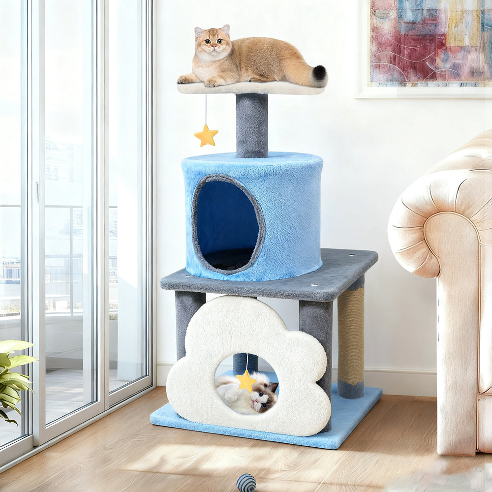 Blue cat tree with a moon-shaped top perch, featuring a plush cloud cave and a star toy for playful lounging.