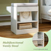 Multifunctional vanity stool with cushion and adjustable shelf, designed for compact spaces and under-seat storage.