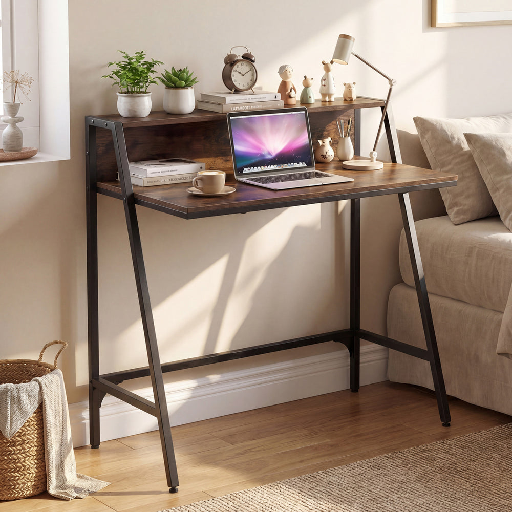 Industrial desk with a rustic brown finish and raised shelf, perfect for small spaces and organized work areas.