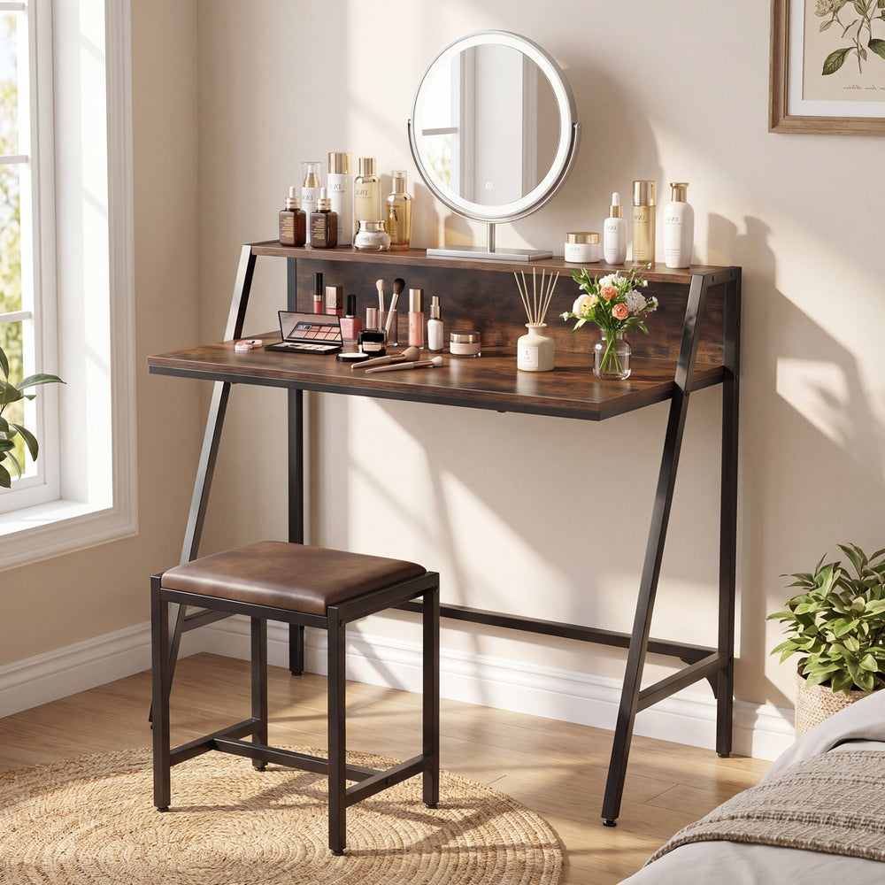 Rustic brown industrial desk with metal frame and raised shelf, ideal for stylish organization in compact spaces.