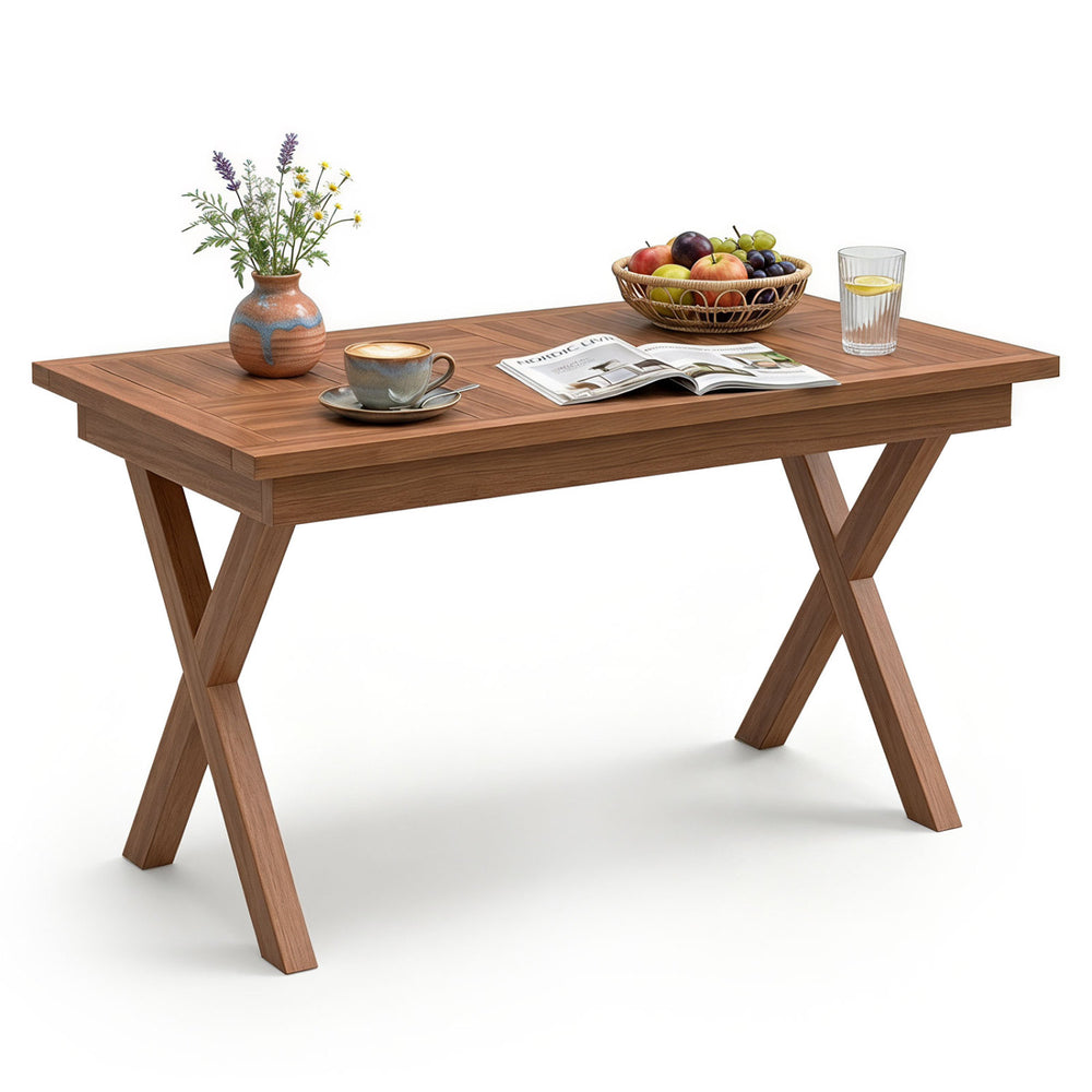 Teak wood coffee table with slatted tabletop, X-shaped legs, perfect for outdoor use on the patio or garden.