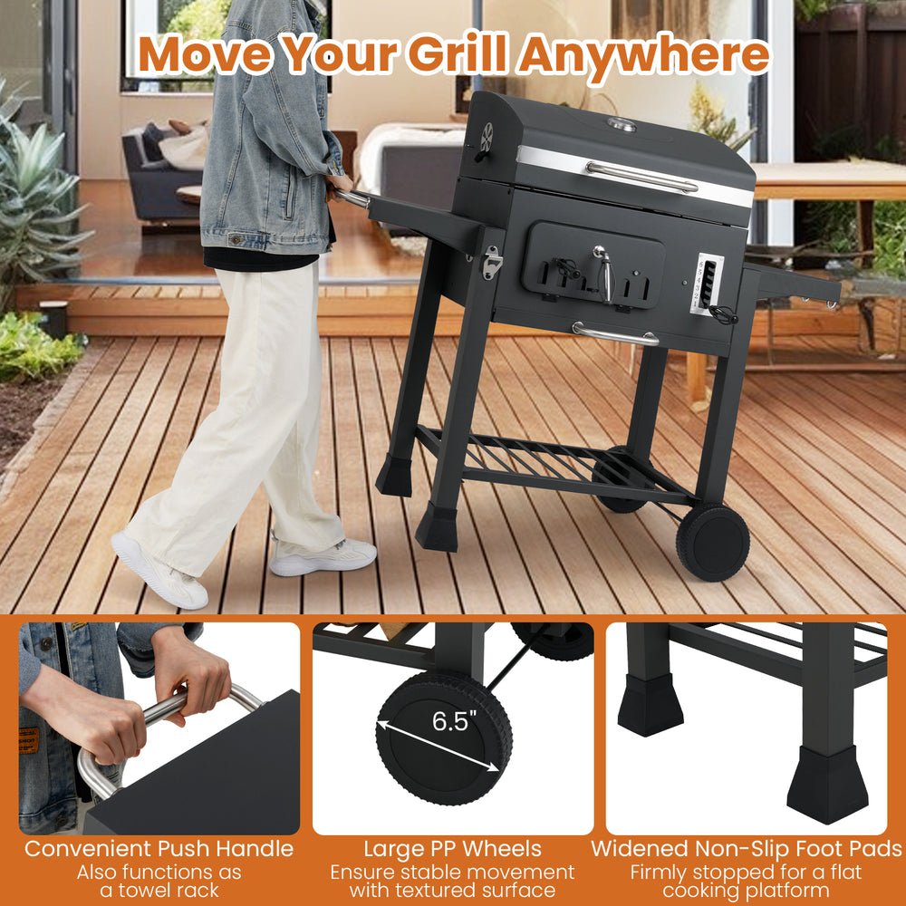 24-inch barrel charcoal grill with folding side tables, large wheels, and push handle for easy movement and convenience.