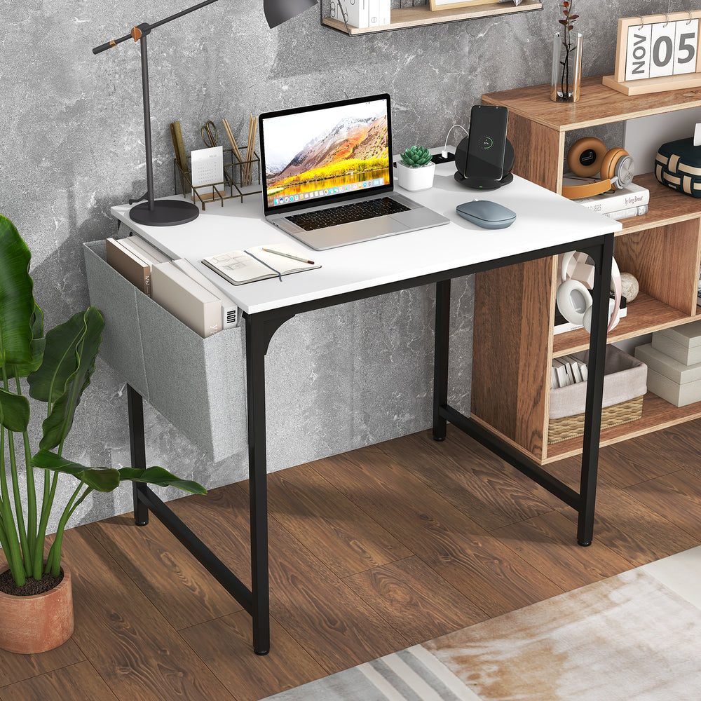 32-inch white computer desk with built-in charging station and extra storage bag, ideal for home office use.