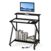 Rolling black computer desk with ergonomic monitor shelf, built-in power outlets, and compact design for small spaces.