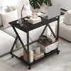 Rolling black computer desk with ergonomic monitor shelf, power outlets, and storage, perfect for small spaces.