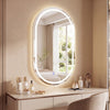 32x20" oval LED bathroom mirror with a sleek silver finish, offering a stylish design and efficient lighting for modern spaces.