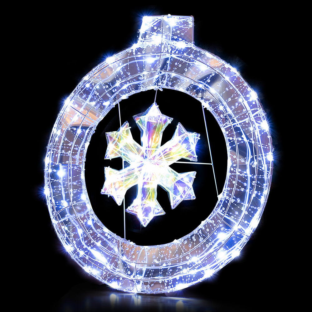 33-inch lighted snowflake wreath with 128 LED lights, featuring a hanging ring for festive indoor and outdoor decor.
