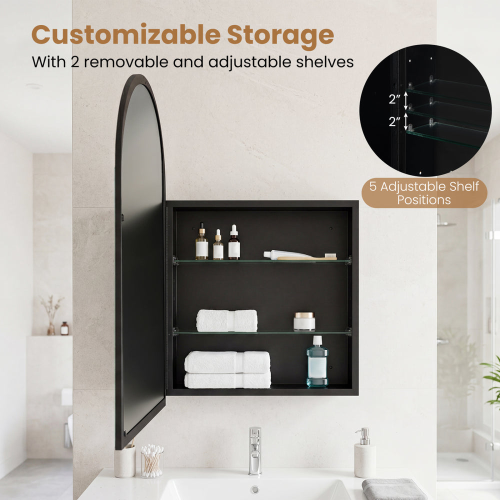 Brushed metal wall-mounted storage cabinet with arched mirror and two adjustable shelves for customizable bathroom storage.