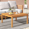Acacia wood coffee table with spacious tabletop, ideal for serving drinks in backyard or poolside settings.