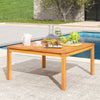 Acacia wood coffee table with slatted design, ideal for outdoor use by the poolside or on the balcony.