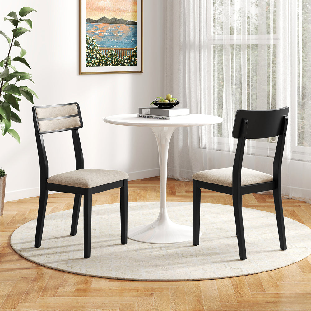 Modern dining chairs set of 2 with tilt backrest, black rubber-wood legs, and padded linen-feel fabric for comfort.