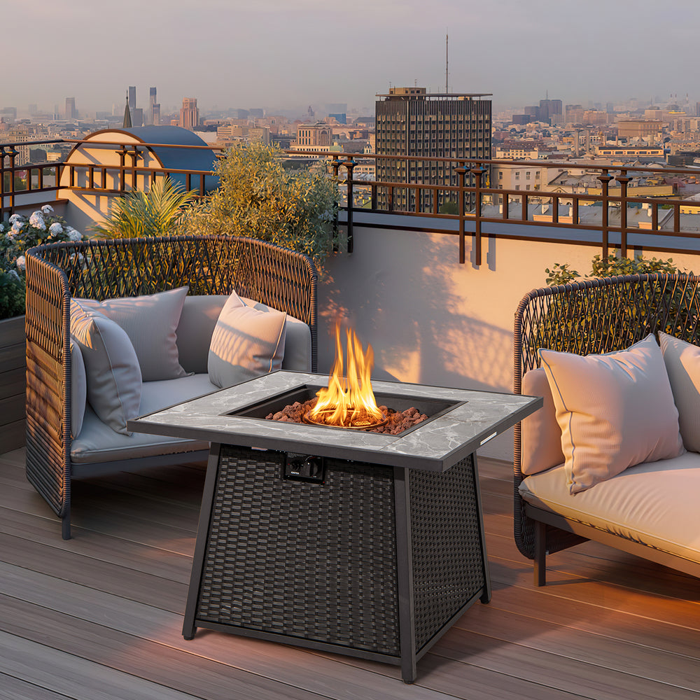 35-inch propane gas fire pit table in black wicker rattan with lava rocks, perfect for outdoor gatherings and dining.