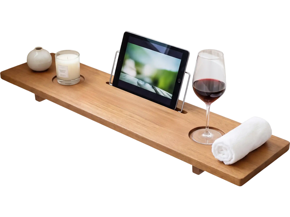 Wood bath tray with adjustable legs, cup holders, and tablet slot for enhancing your relaxation experience in the tub.