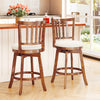 Set of 2 360° rotating counter height chairs with upholstered seats and backrests in solid rubberwood for kitchen use.