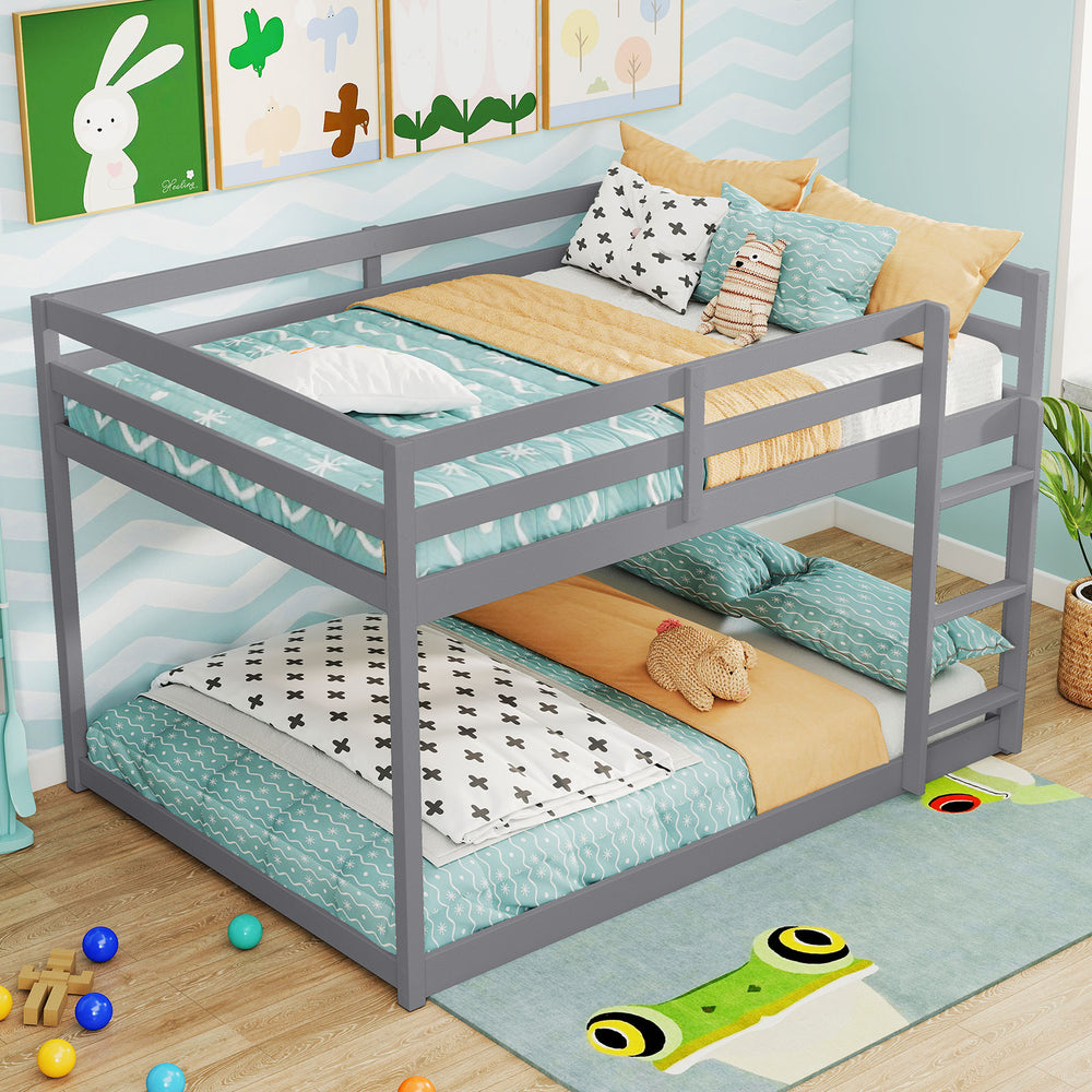 Gray full over full low-to-ground bunk bed showcasing a spacious sleeping area for kids, featuring dual anti-toppling.