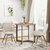 Round 36-inch wood dining table with wing-shaped pedestal base, grey finish, ideal for cafes or kitchens.
