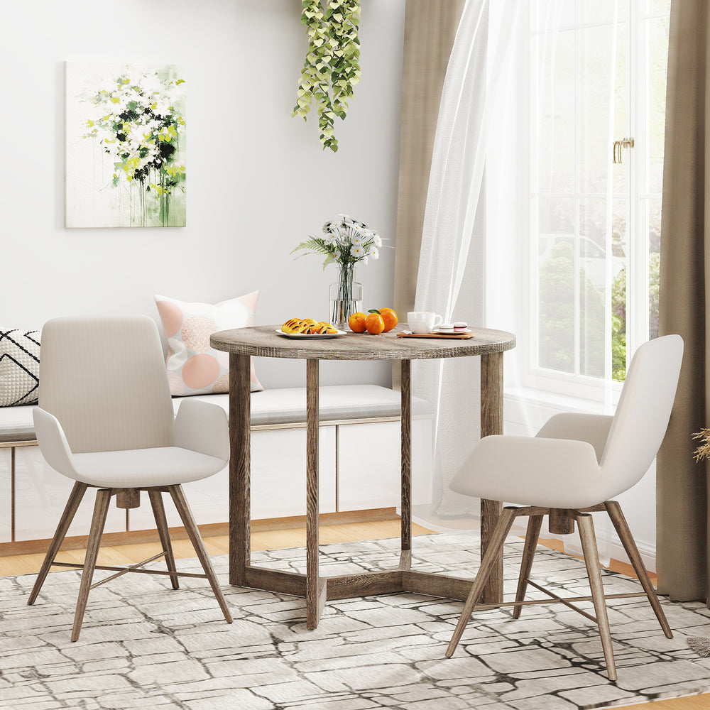 Round 36-inch wood dining table with wing-shaped pedestal base, grey finish, ideal for cafes or kitchens.