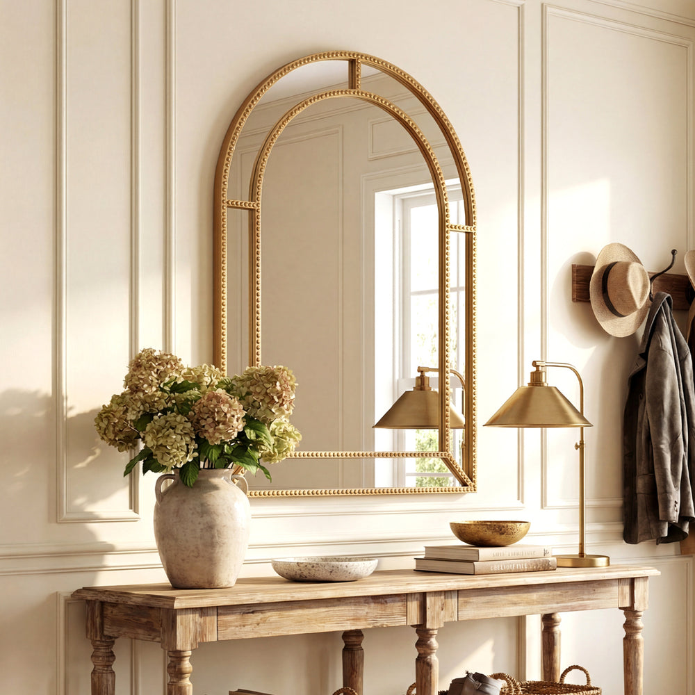 Gold beaded frame decorative mirror, 36 x 24 inches, adds elegance to living rooms and entryways.