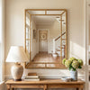 Gold wall mirror with beaded frame, 36 x 24 inches, perfect for adding elegance to living rooms or entryways.