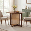 Round 37.5-inch walnut dining table with cross pedestal base and decorative PE rattan design, ideal for cozy dining.