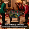 Mini foosball table with vibrant graphics, detachable legs, and smooth metal rods for tabletop fun with family and.