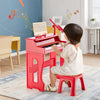 Kids playing the red 37 keys music piano with microphone and detachable music stand, enhancing music skills and fun.