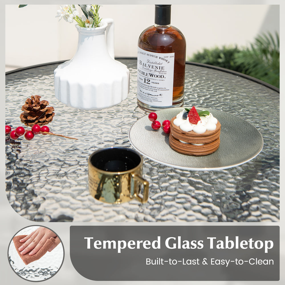 Tempered glass tabletop of a 38-inch patio bar table, featuring a sturdy metal frame for outdoor use.