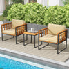 Two acacia wood patio chairs with beige cushions and a side table, perfect for outdoor relaxation by the pool.