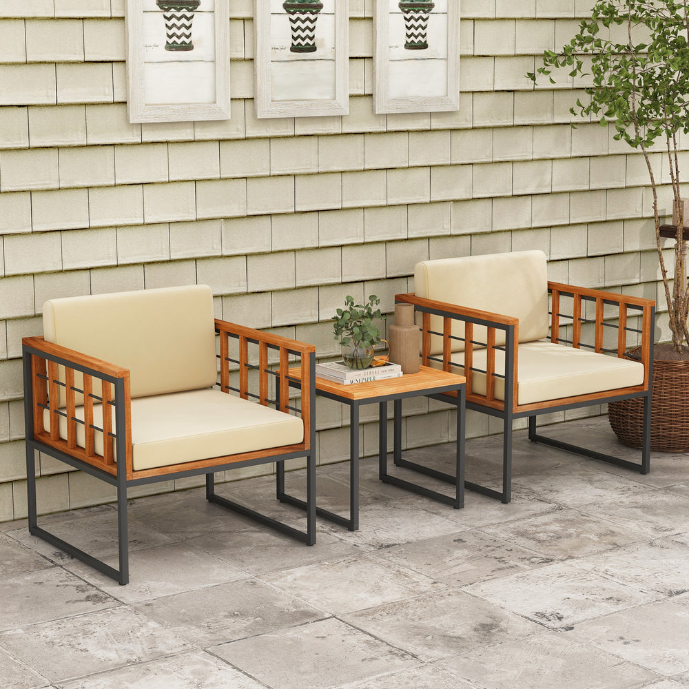 Detail view of soft beige cushions on an acacia wood patio chair set, designed for comfort and style in outdoor spaces.