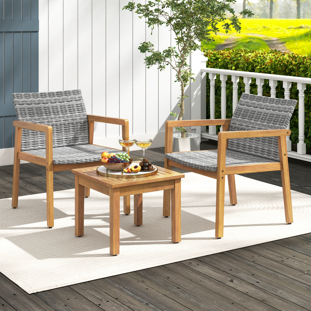 Two chairs with gray PE rattan and a solid acacia wood coffee table, perfect for patio relaxation.