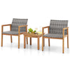 Two acacia wood armchairs with hand-woven PE rattan and a coffee table, ideal for patio or garden relaxation.