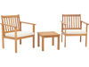 Two acacia wood chairs with soft cushions and a matching table, perfect for backyard or porch relaxation.